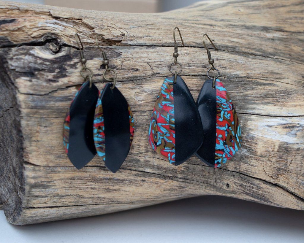 Les nouveautés de la collection Imitation : marbre noir turquoise, rouge et or