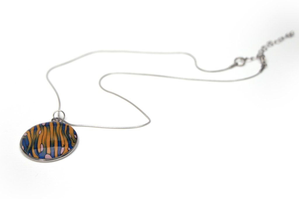 Collection Nature : collier pendentif rond - Disponible sur les marchés artisanaux